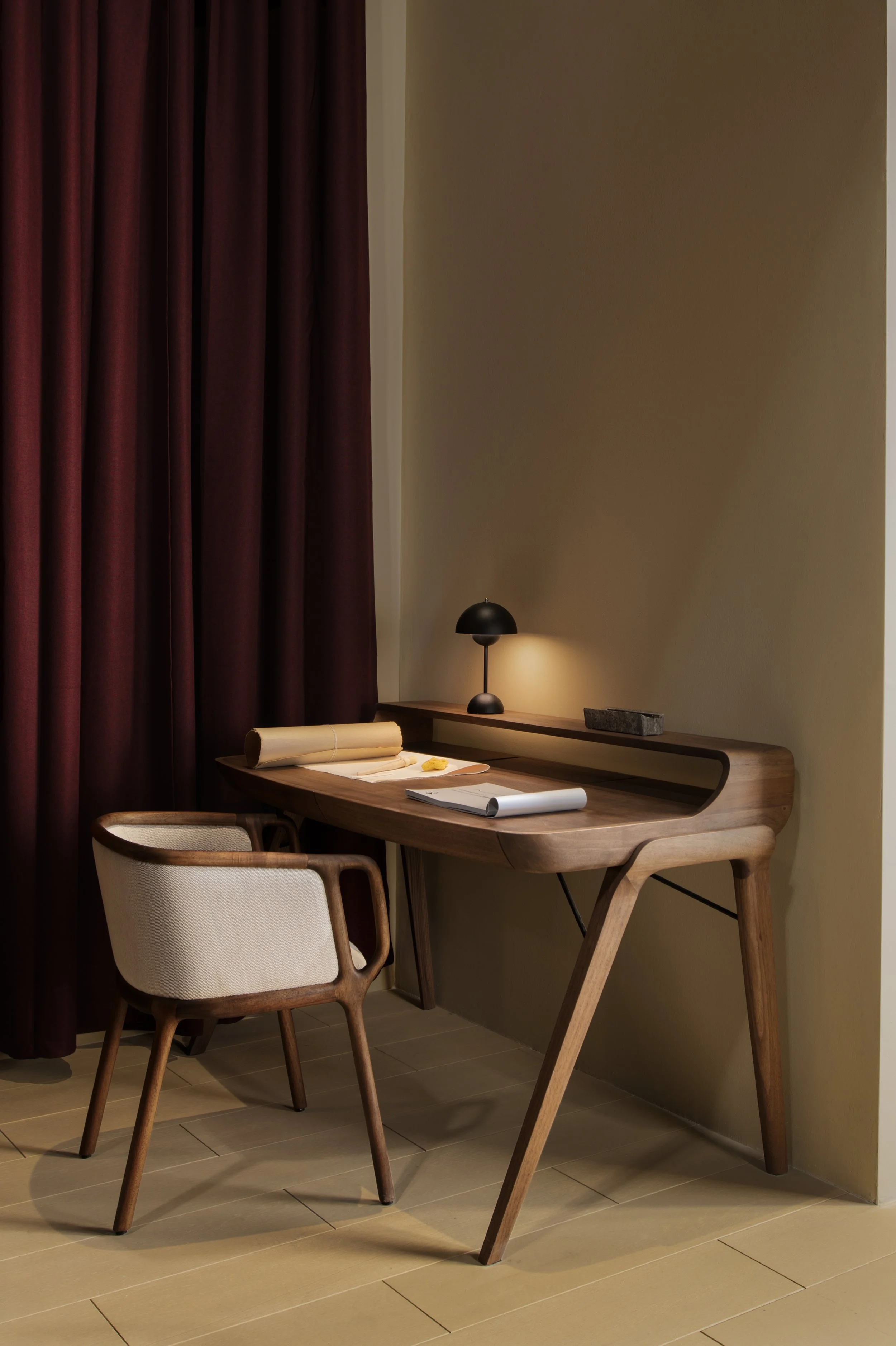 Picard Desk with soft-edged wooden body and elegant lateral legs