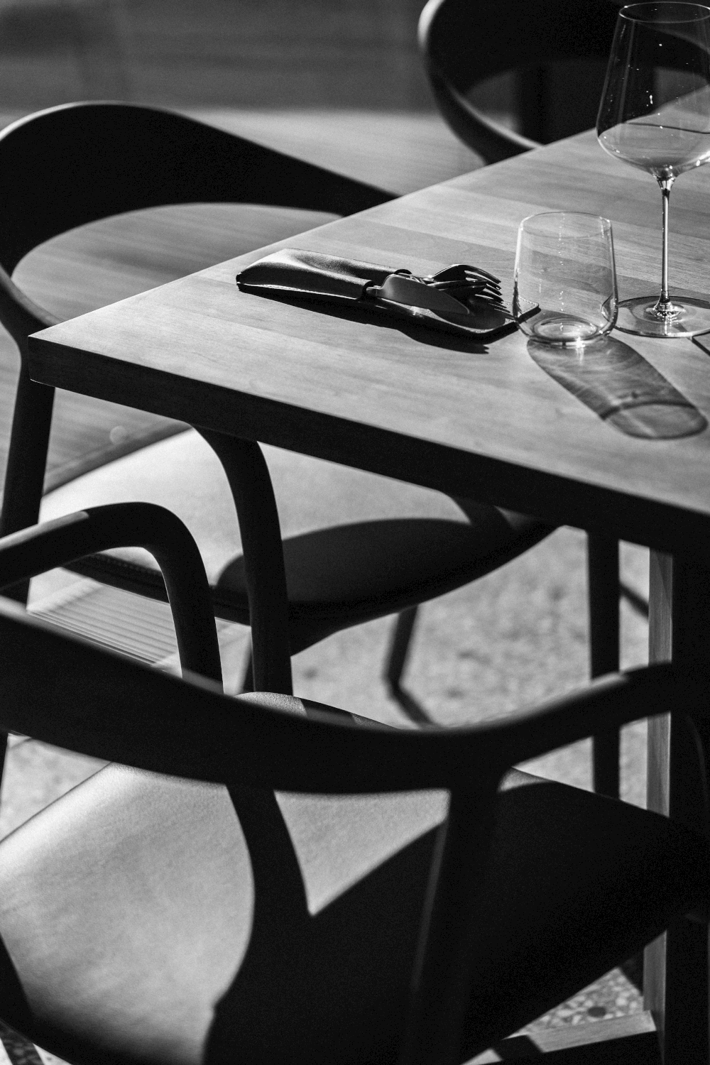 Multiple views of Neva Chair highlighting elegant curves and ergonomic form