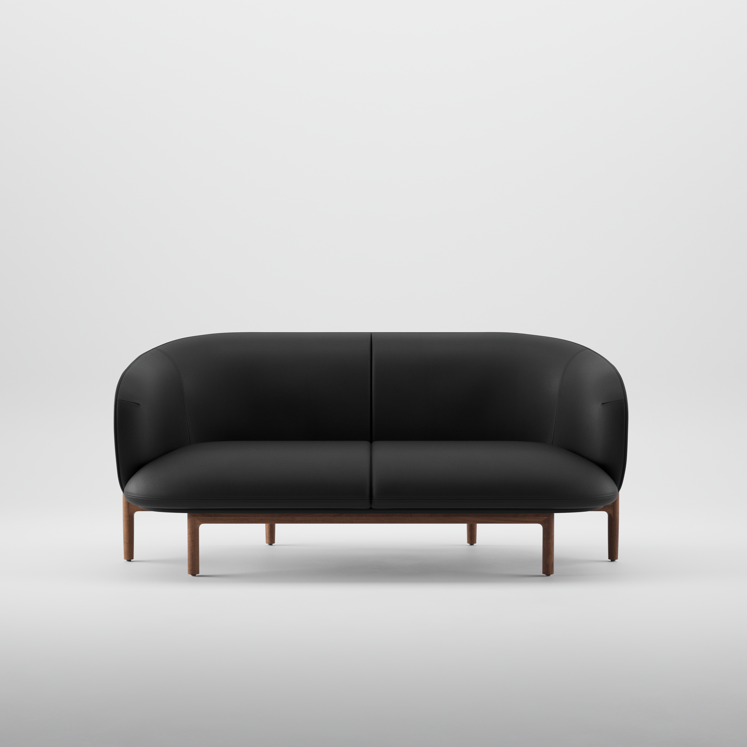 Close-up of the Mela Lounge Two-Seater’s upholstered seat and backrest, showing high-quality fabric or leather and seamless contours.