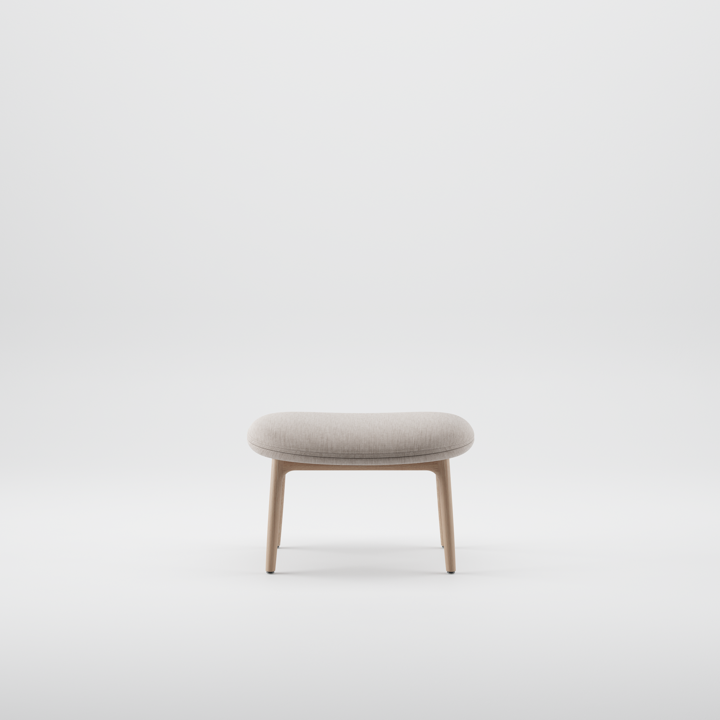 Neva Ottoman with sculpted wooden frame and upholstered seat