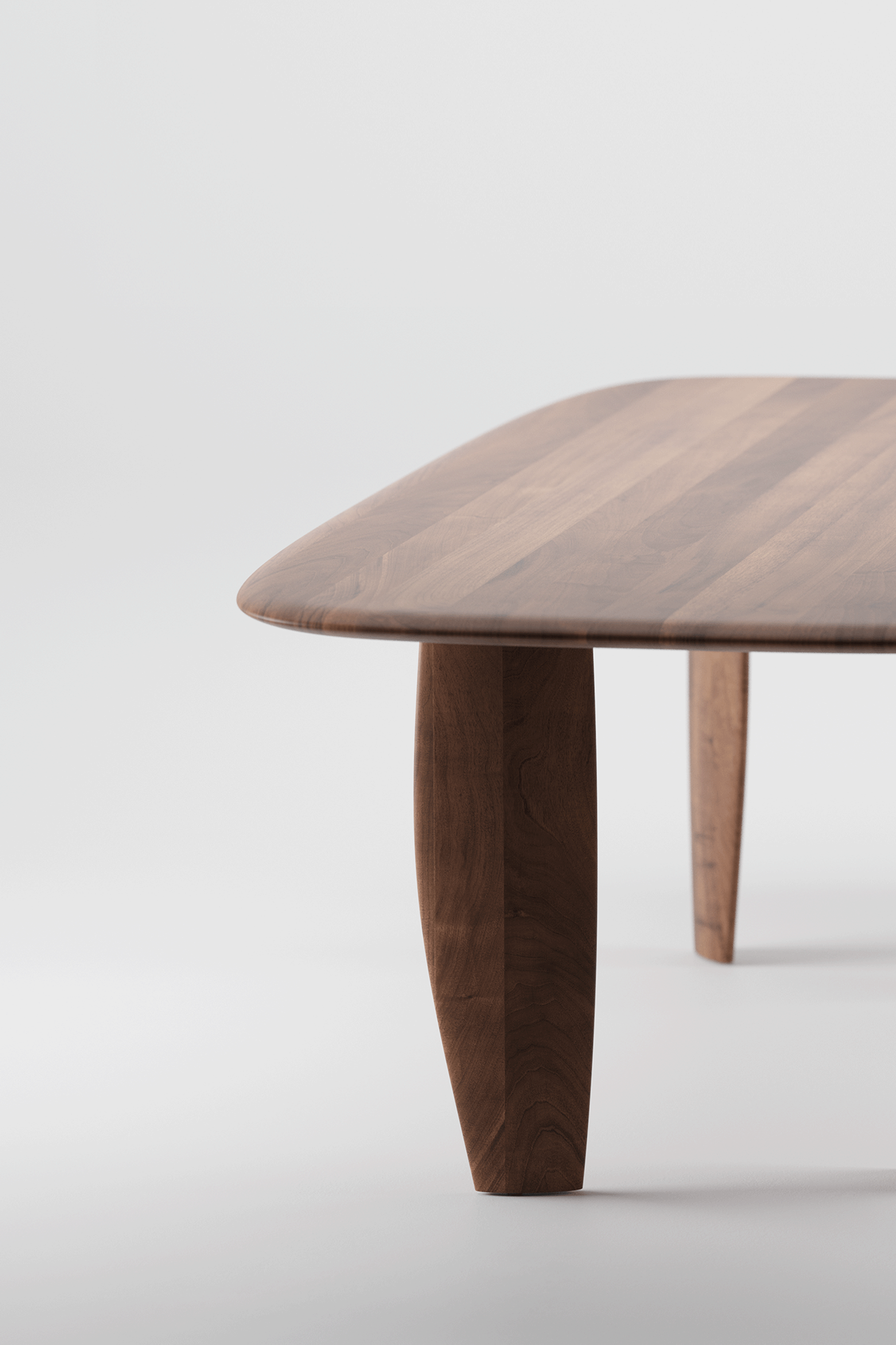 Nilu Table with clean flowing lines and wooden structure