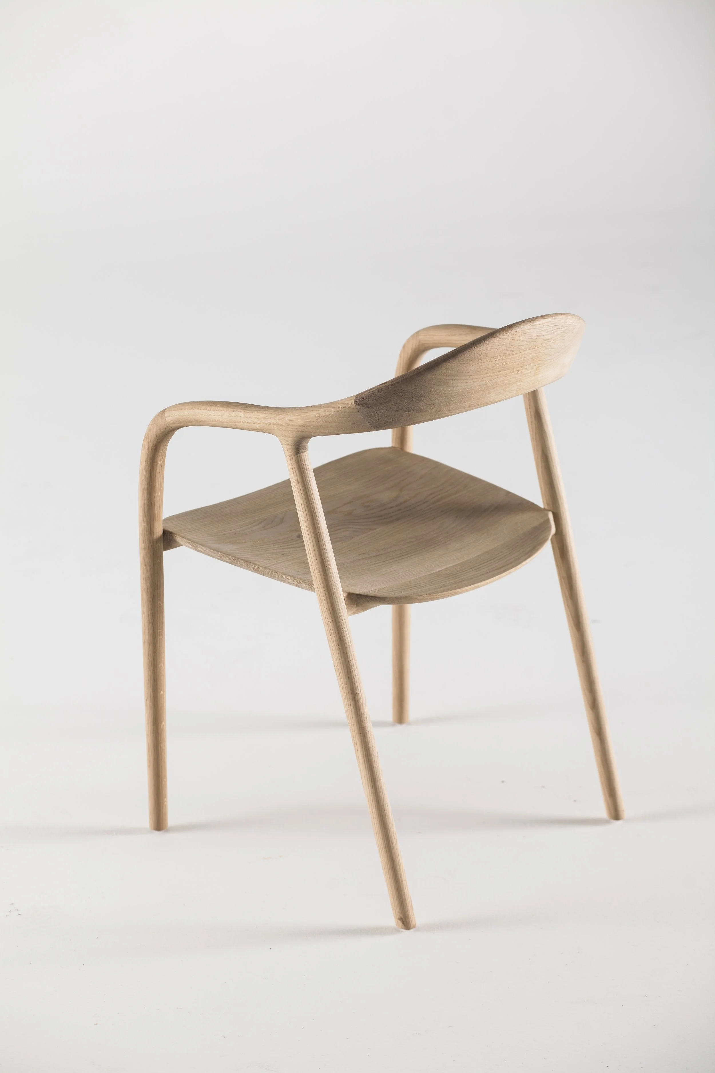 Neva Chair by Regular Company – modern solid wood chair with sculptural, fluid lines