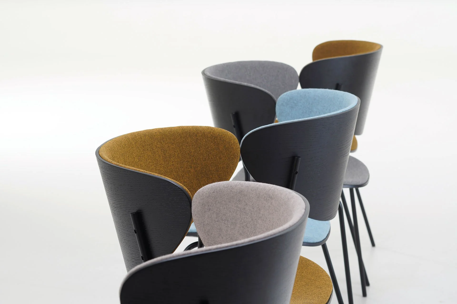 Reclined Bolta Lounge chair hugging the body in elegant curves