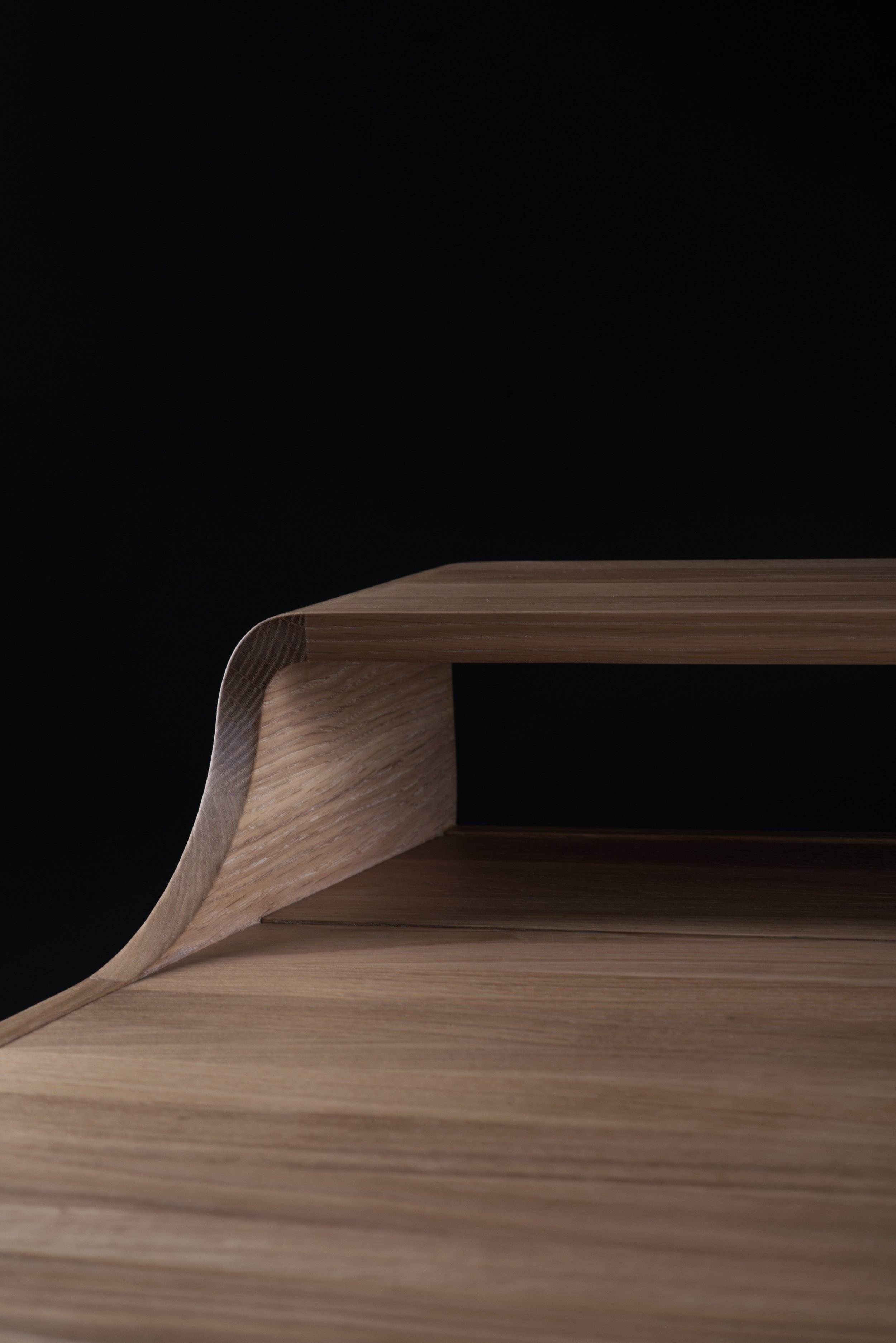 Picard Desk with soft-edged wooden body and elegant lateral legs