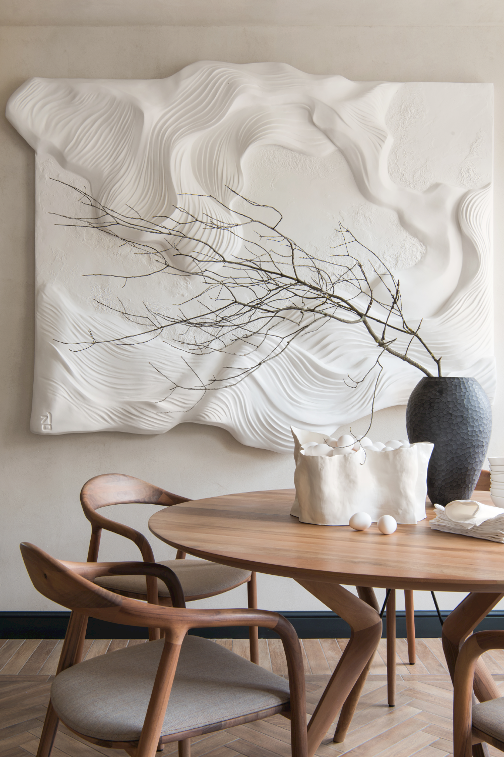 Multiple views of Neva Chair highlighting elegant curves and ergonomic form