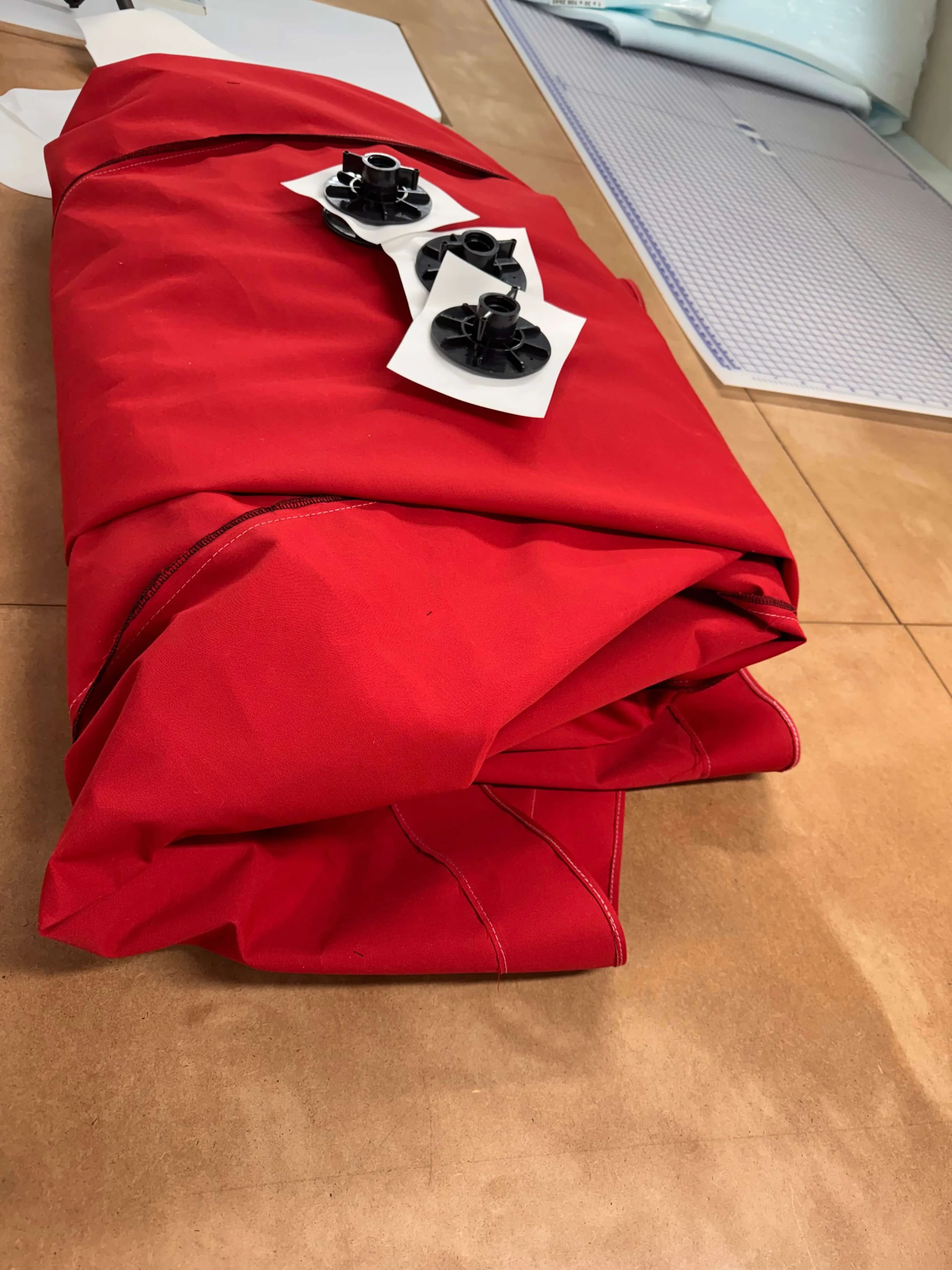 Beautiful Jockey Red Sunbrella mooring cover ready for a spring snap installation with vented poles.jpeg