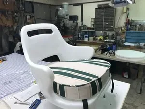 Molded boat seat with new cushion bottoms - Robie Canvas