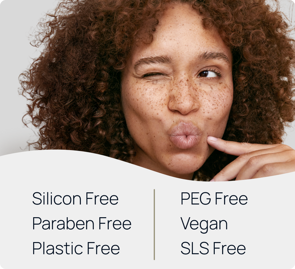 A woman with curly hair making a kissy face and holding her chin with her hand. Text below lists skincare free from silicon, parabens, plastic, PEG, vegan, and SLS.