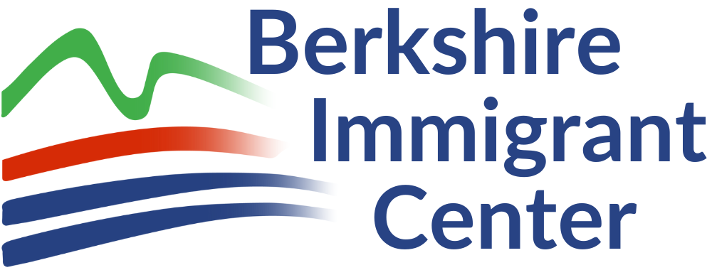 Logo of Berkshire Immigrant Center with stylized mountain, red and blue lines, and text.