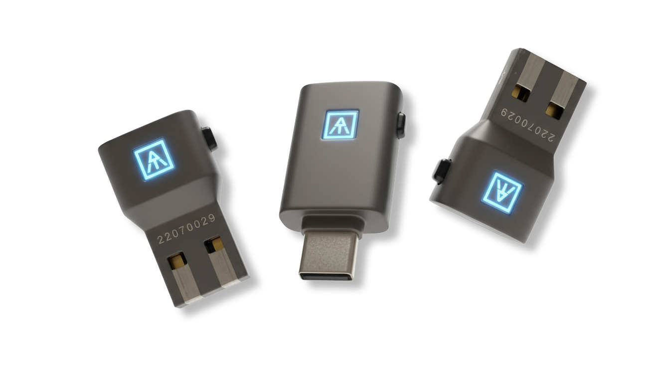 Three USB security keys with illuminated logos, one with a USB-C connector and two with USB-A connectors, floating against a black background.
