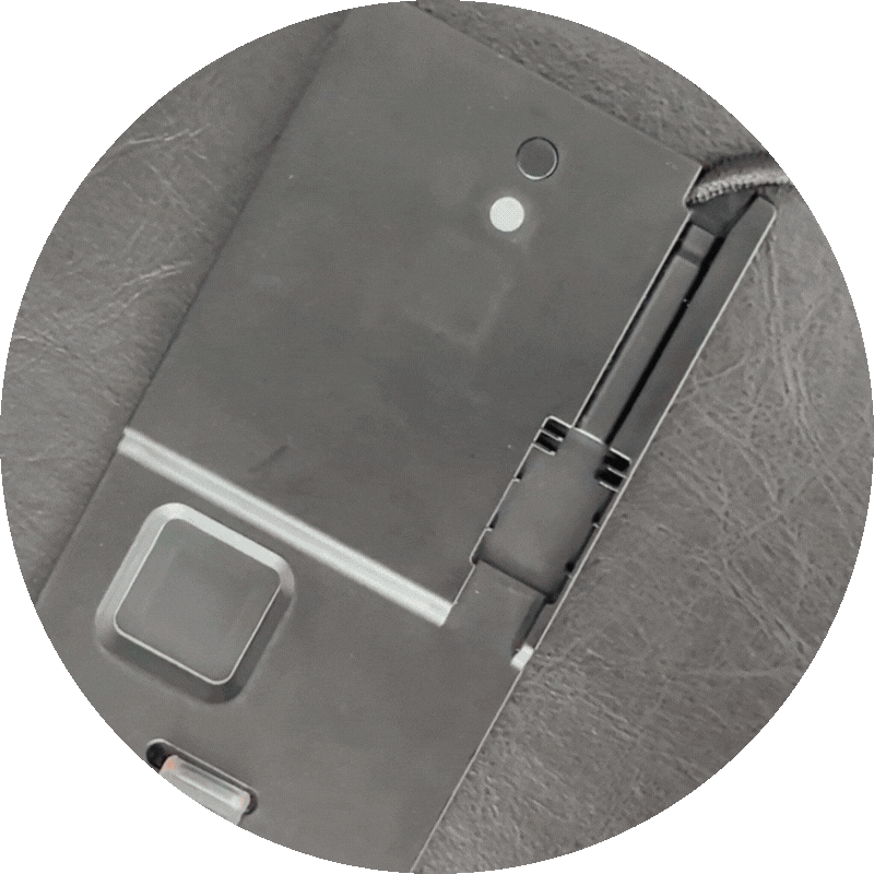 Close-up of an ATKey.Badge plugged in. The user authenticates with the fingerprint and the LED turns green.