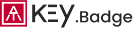 Logo of KEY.Badge with a pink shield and black key icon above the company name.