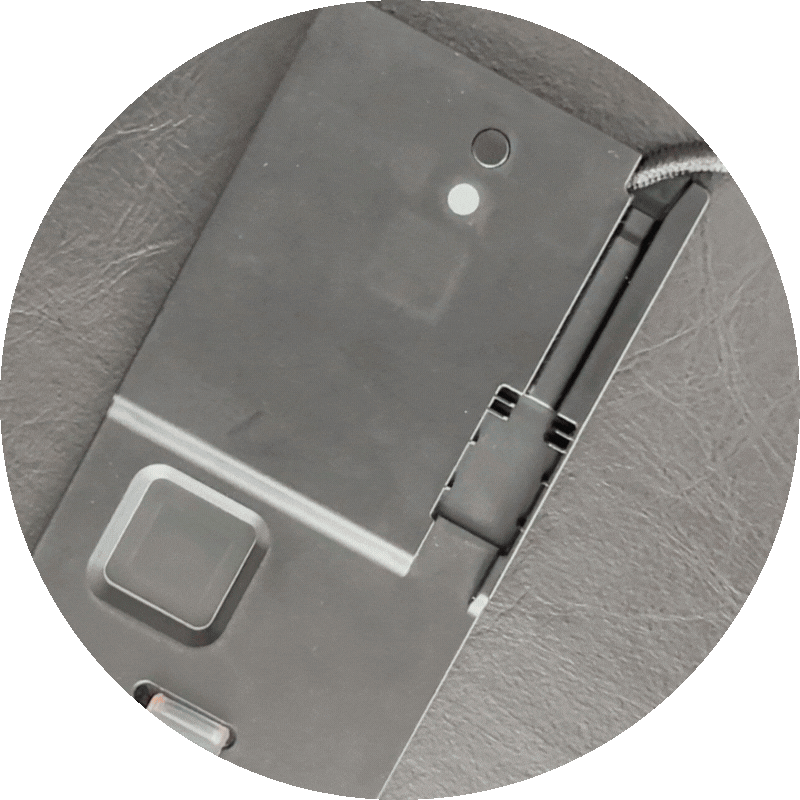 Close-up of an ATKey.Badge plugged in. The user authenticates with the fingerprint, is unsuccesful and the LED turns red.