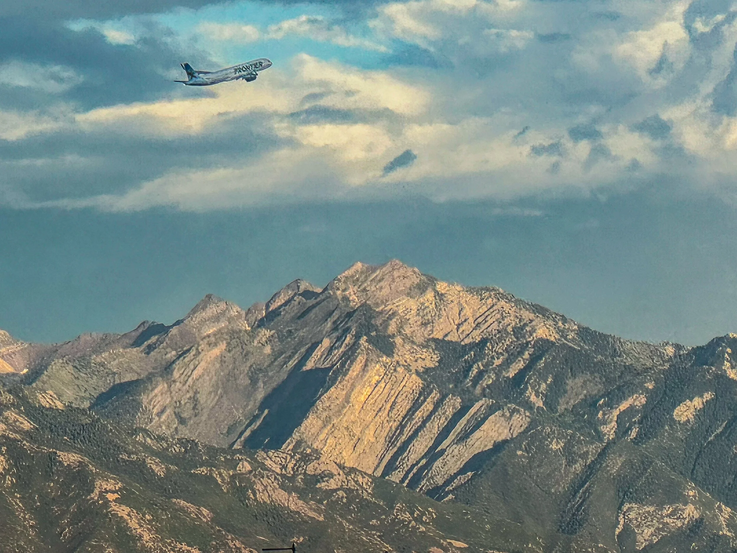 Mountain Departures - Frontier Airlines - Denver, Colorado