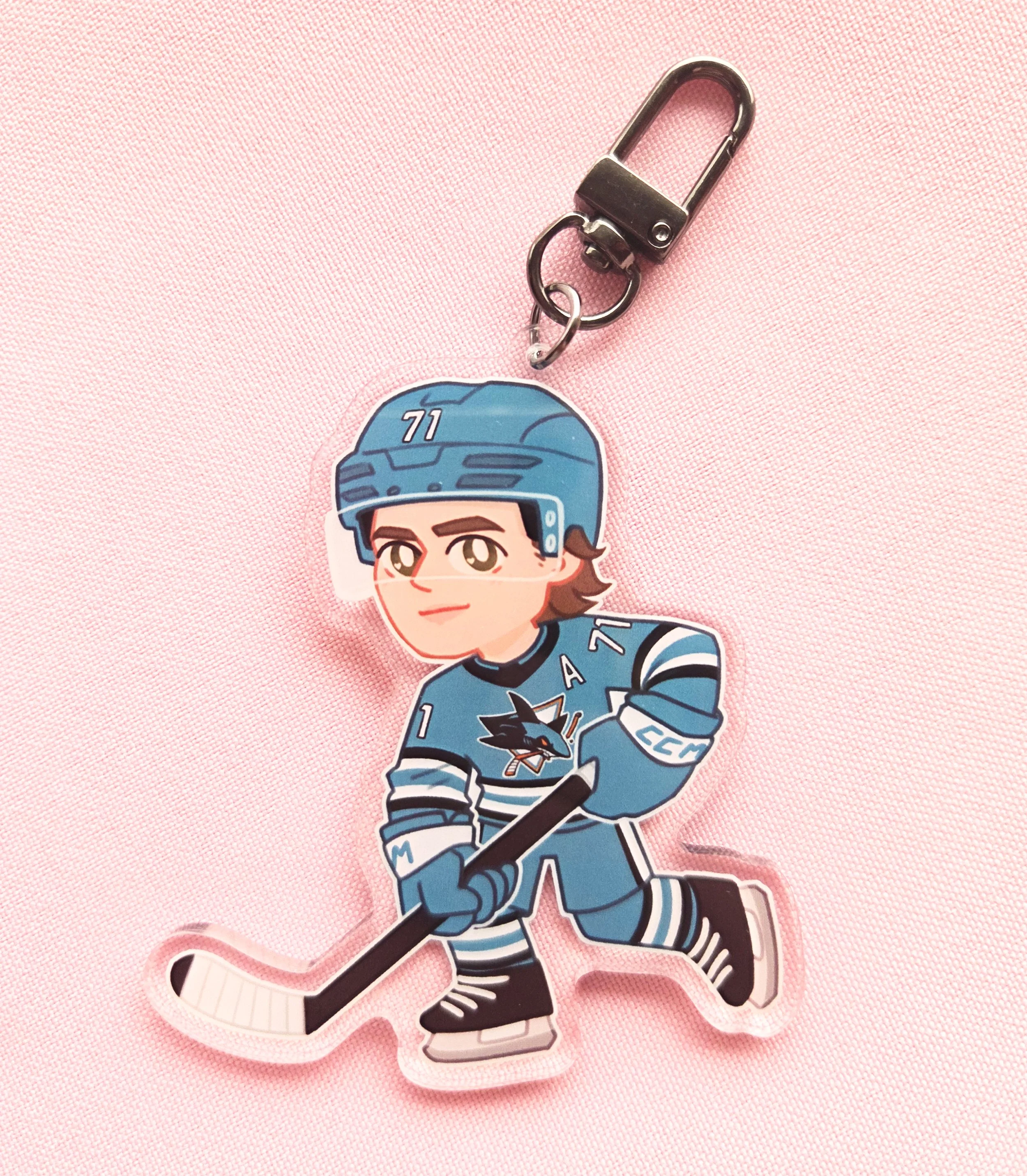 Macklin Celebrini charm