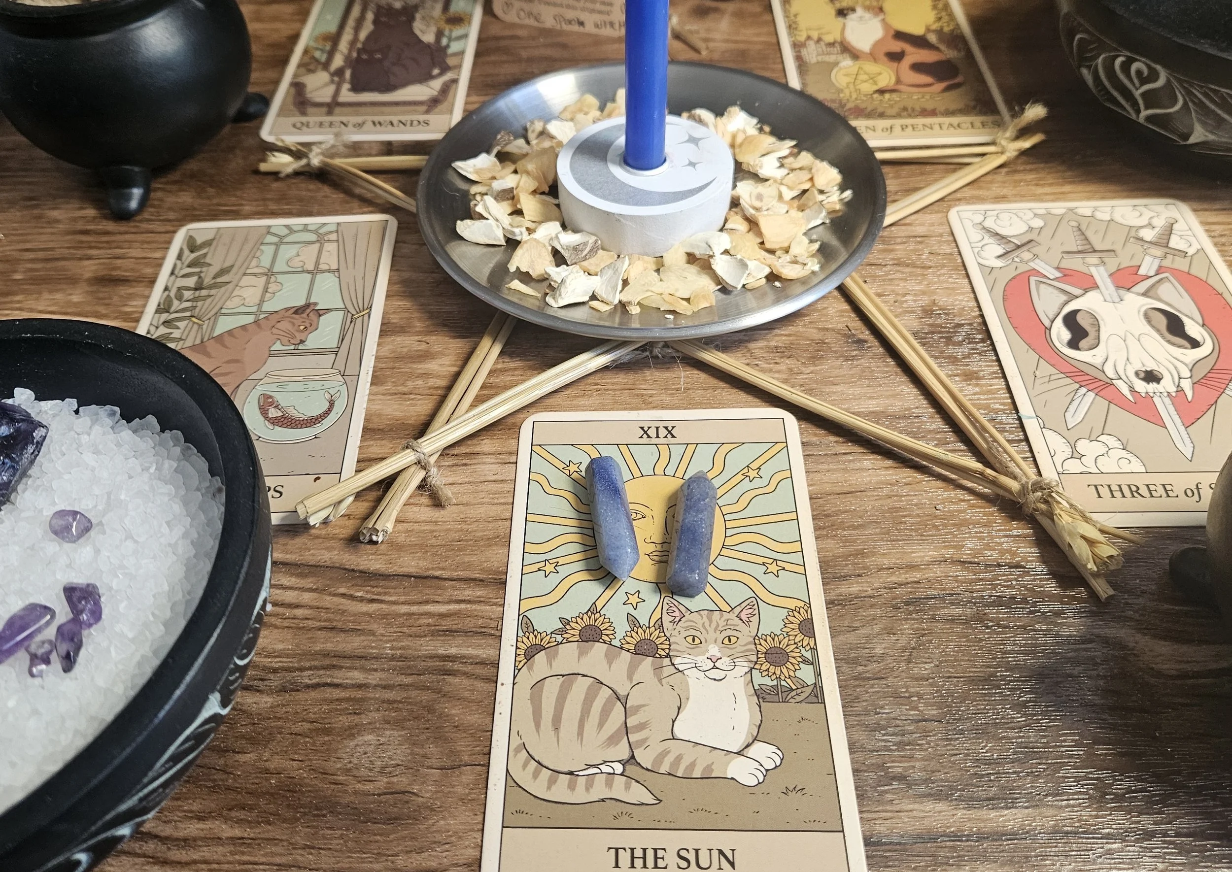 A close-up of the optional upgrade amulet featuring a small, polished blue lapis crystal tower pendant for the Health and Healing Spell.