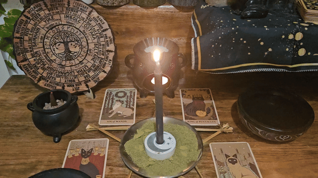 A short video showing the manifestation process of a same-day money and prosperity spell, using abundance herbs, candles, and focused air ritual energy.