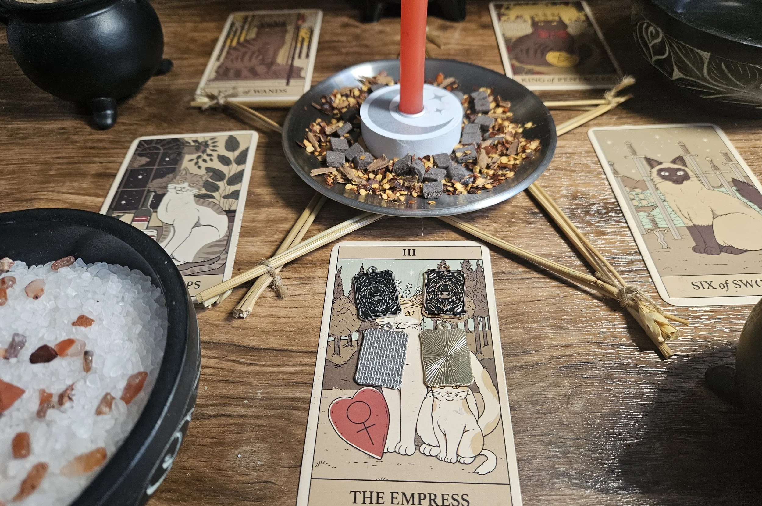 The Empress tarot card featuring a regal woman surrounded by nature, symbolizing fertility, abundance, and nurturing energy.