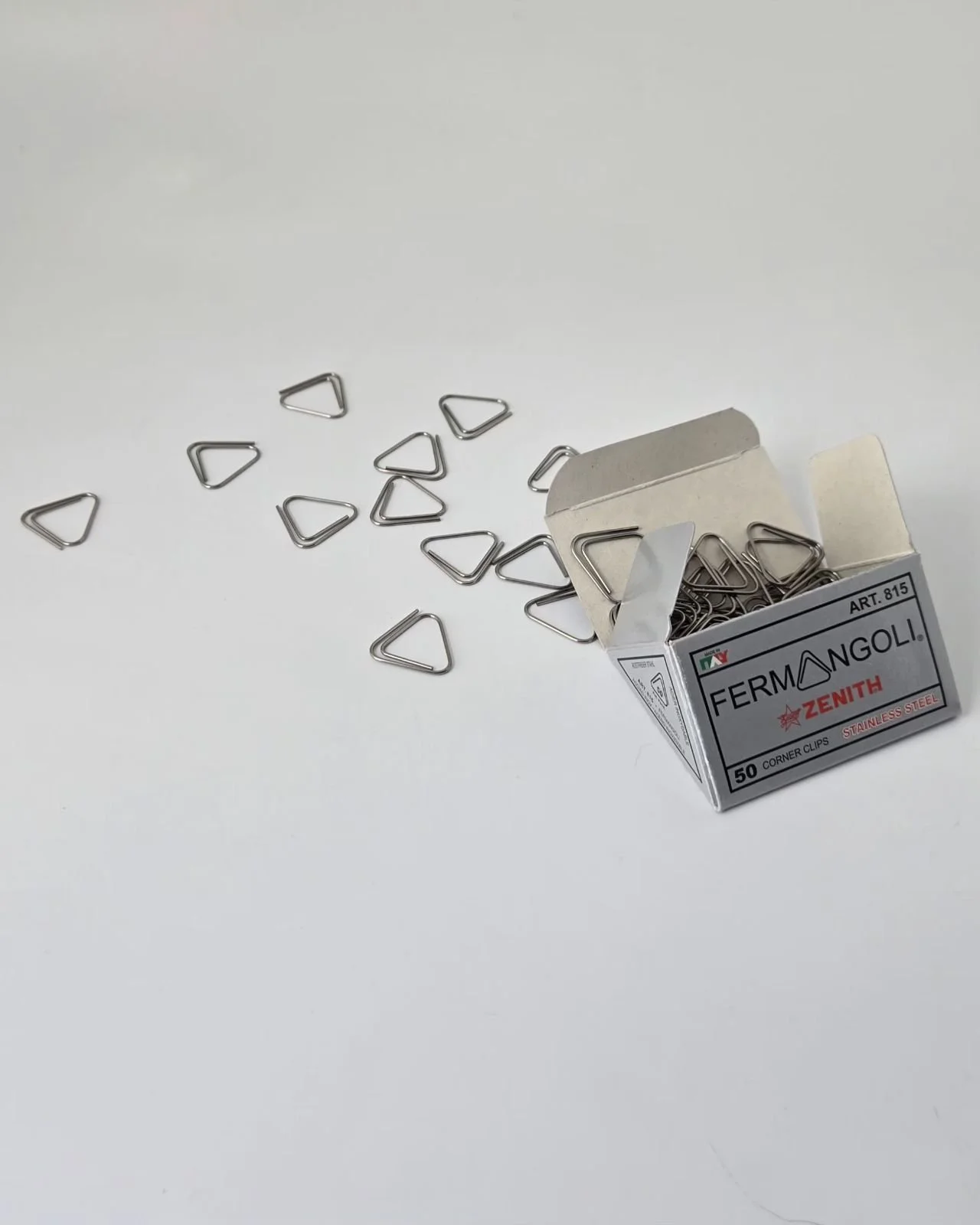 fermangoli zenith paperclip box open 3-4 scattered.jpeg