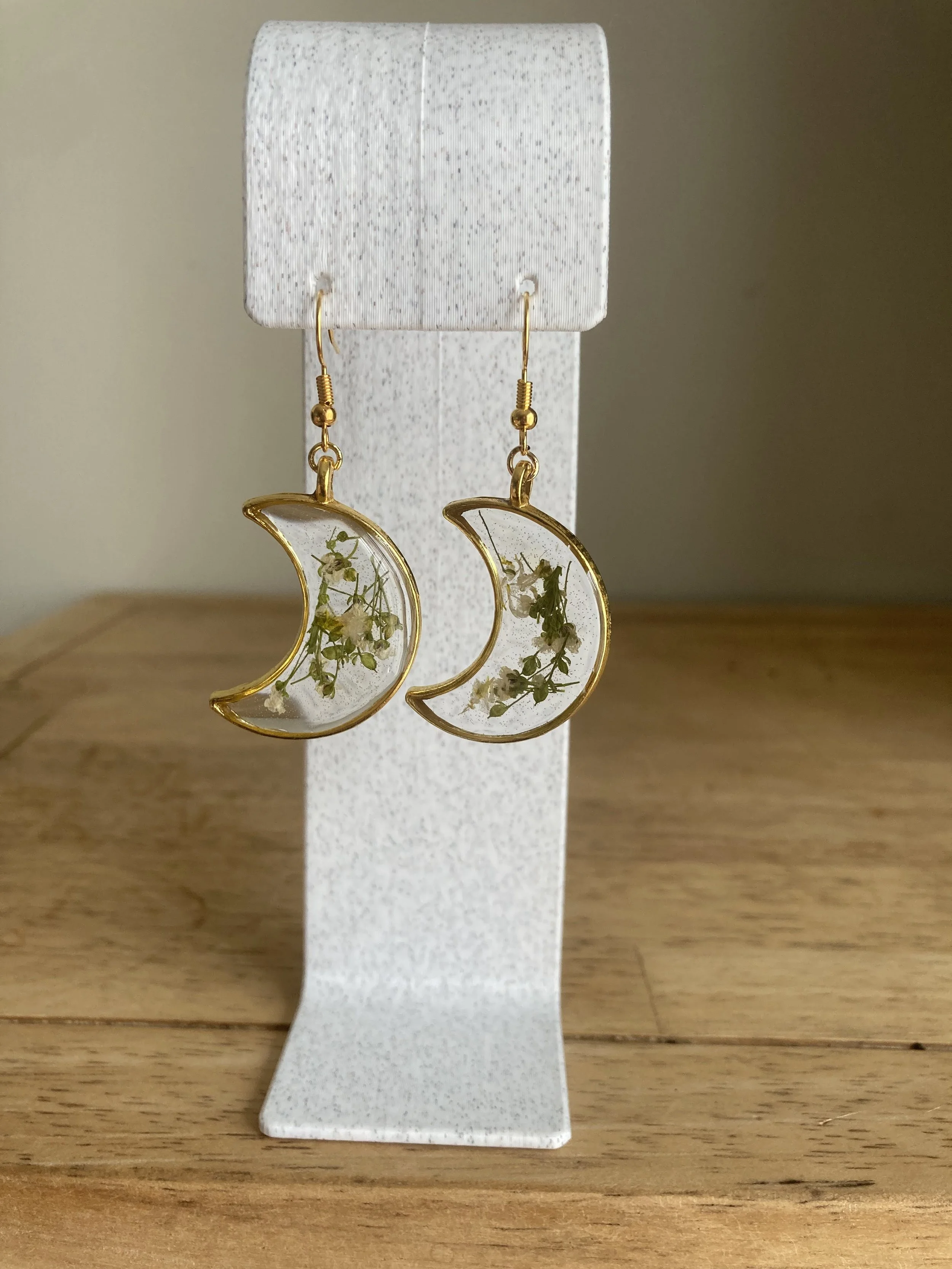 White Floral Crescent Drop - Dec 2025