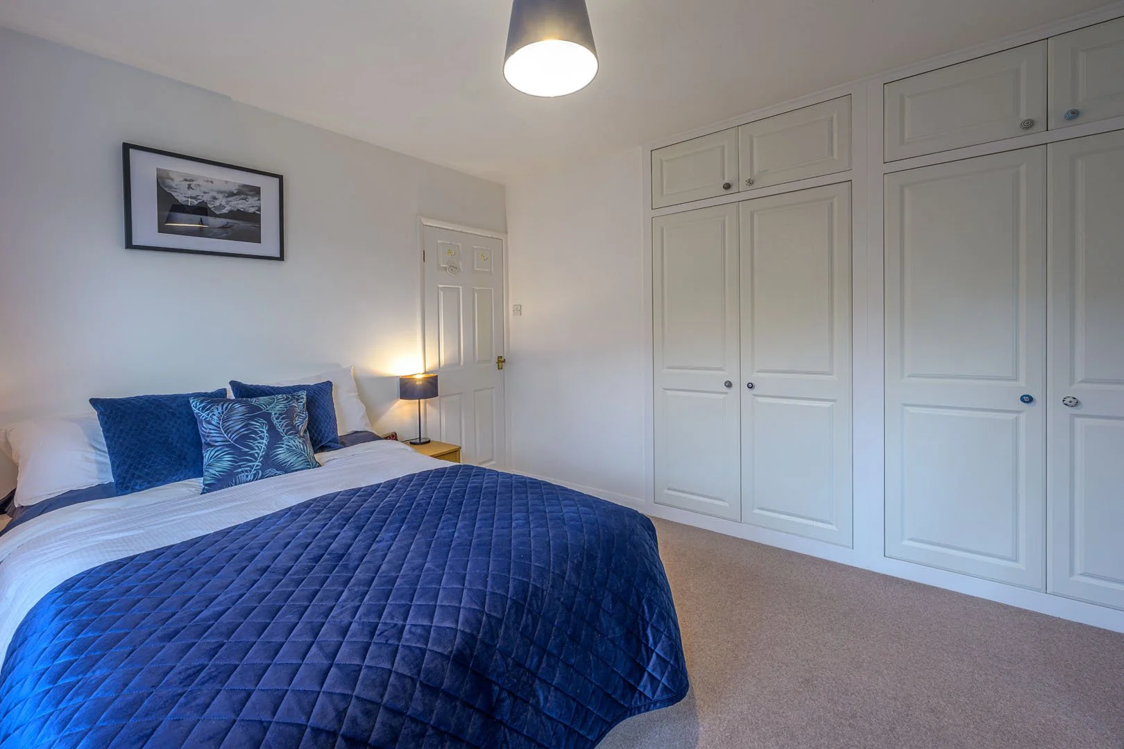 bedroom with fitted wardrobes