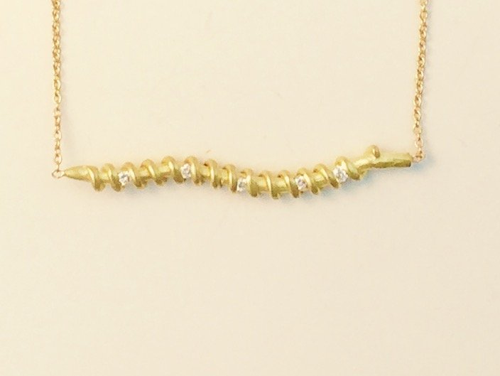  Screw 
 Screw necklace with diamonds