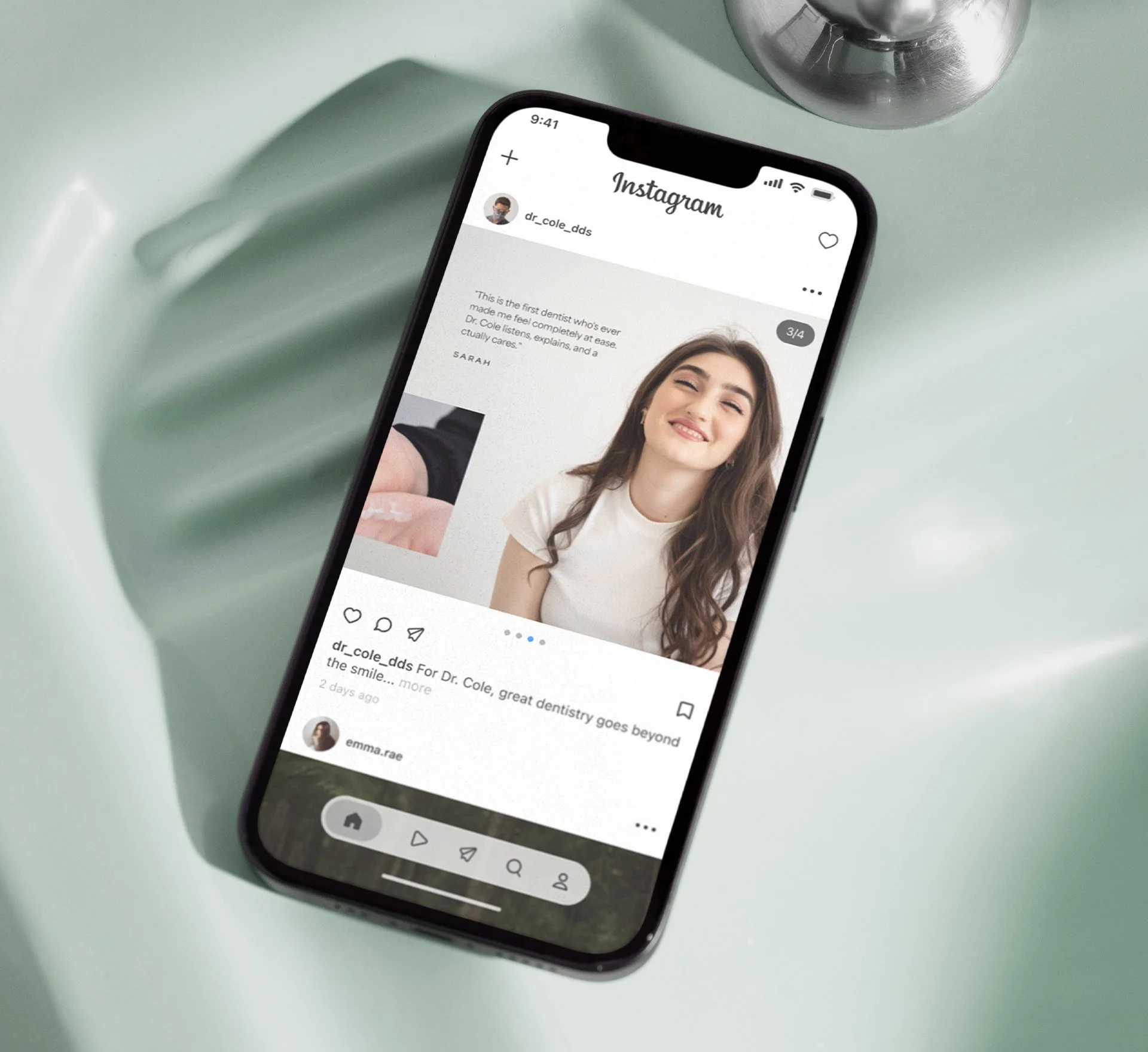 A phone sitting on the edge of a sink, showing an Instagram post for a dental practice.