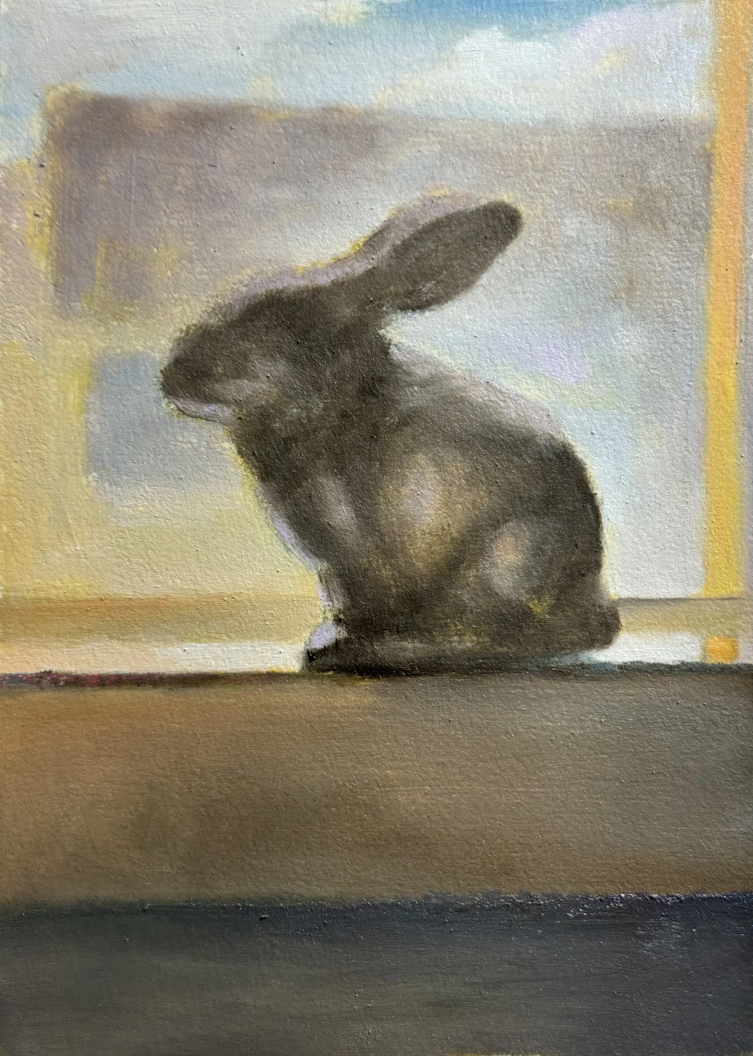 A watercolor painting of a brown rabbit sitting on a flat surface, with a softly colored abstract background.