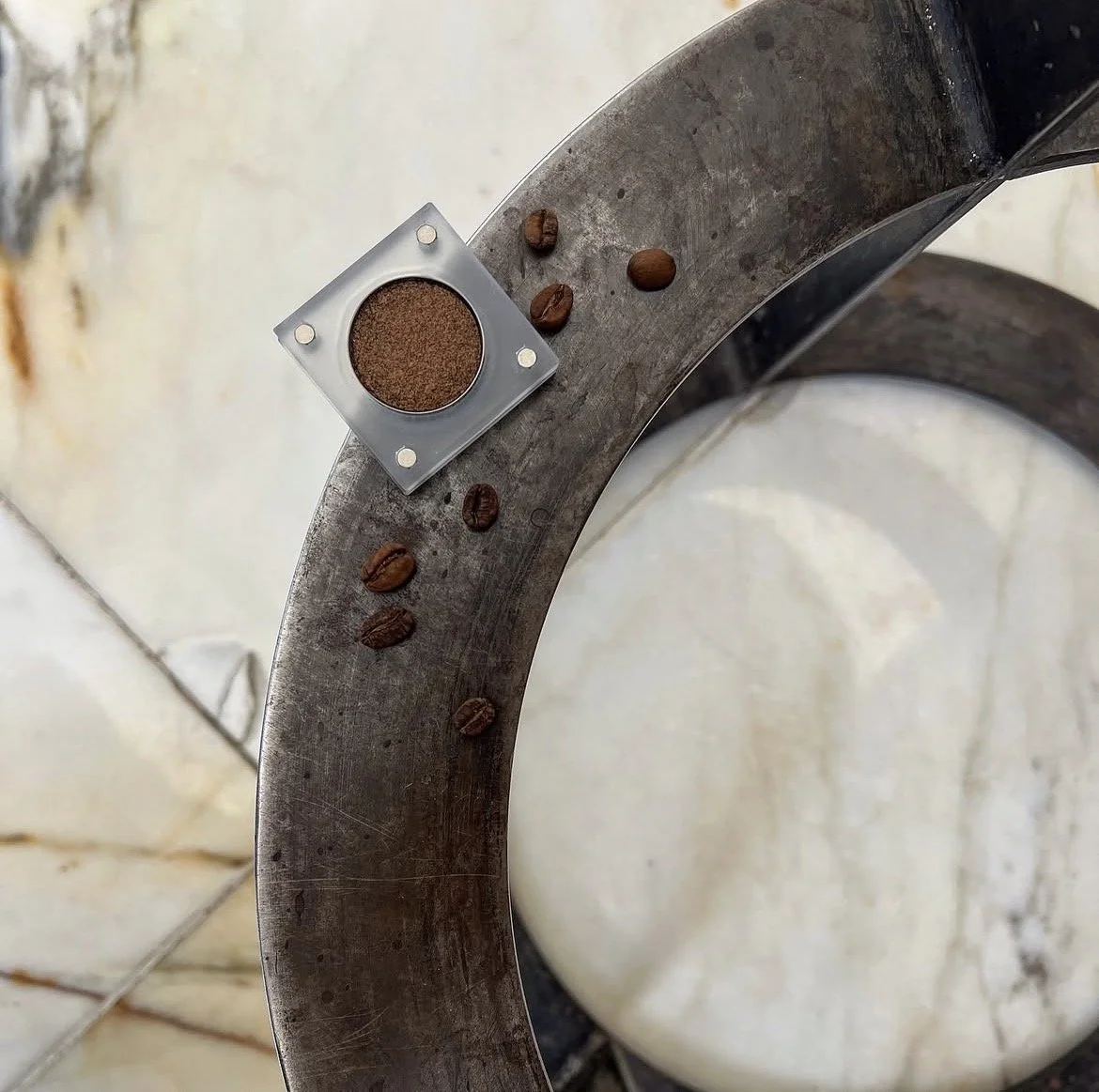 High-pigment bronze metallic eyeshadow named Restless Espresso in transparent magnetic case by The Imperfectionist.