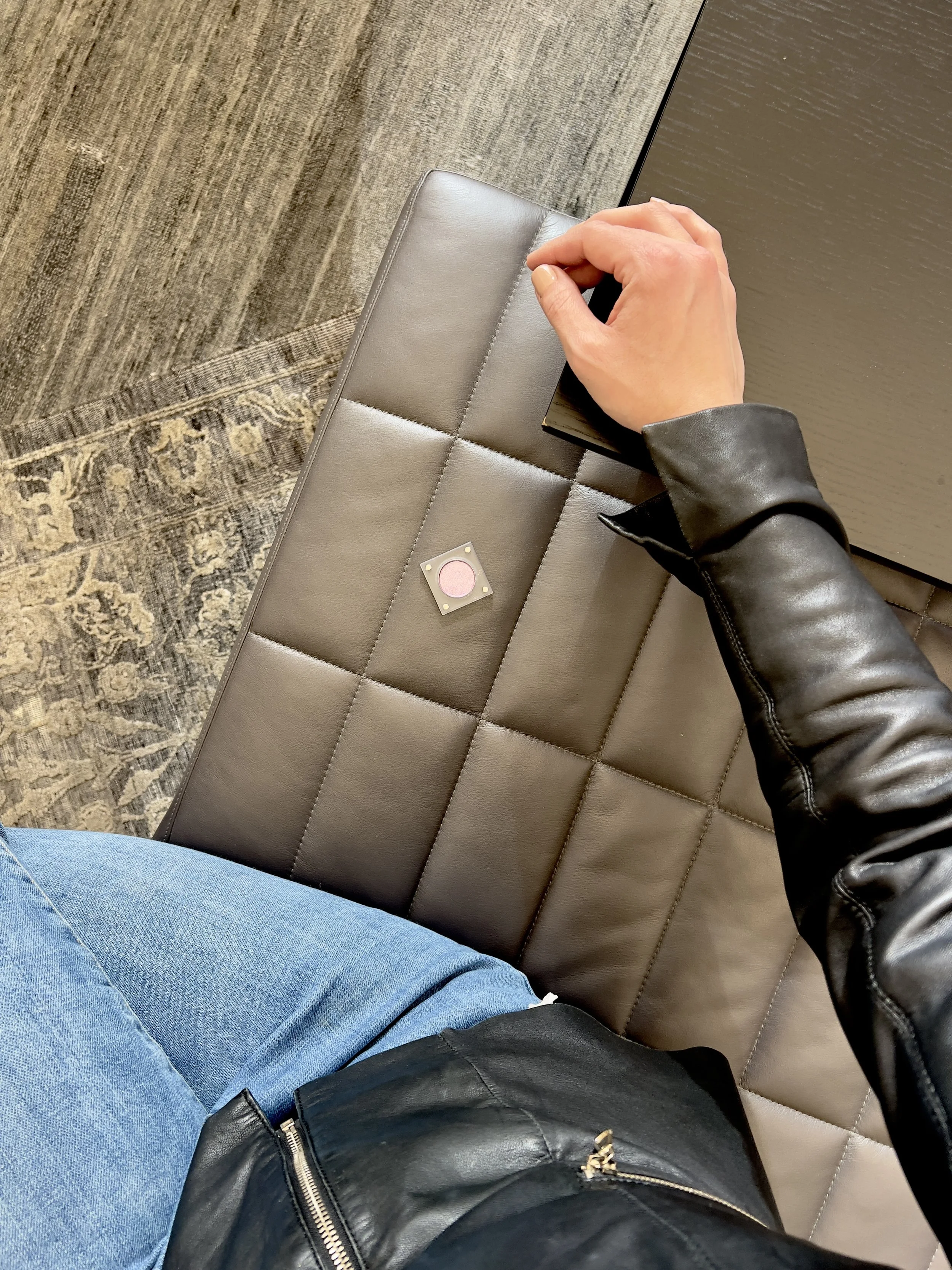 Cool silvery-lavender eyeshadow on leather sofa in transparent magnetic case by The Imperfectionist