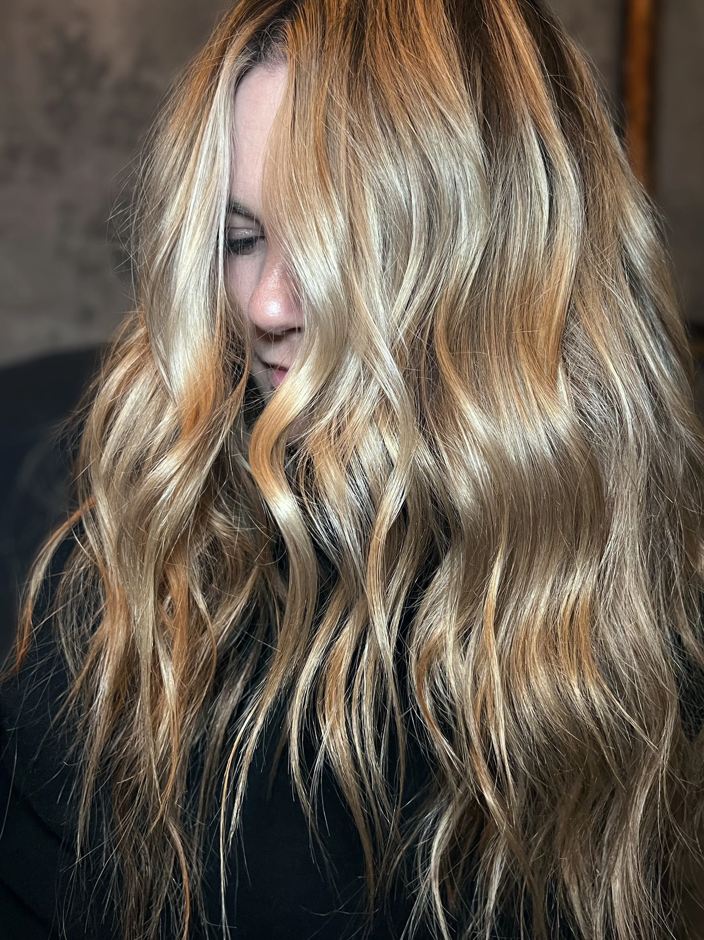 close up of an after LUNA METHOD hair extensions install done by NEW YORK luna method trainer Stef Maccabee at her hair salon suite rebel & rose studio in white plains NY