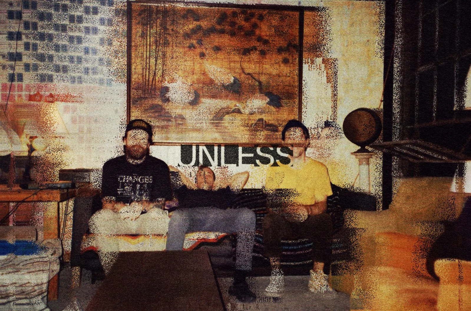 Daniel Davison, Mike Weiss, and Bryan Taylor sitting on a sofa at Headroom Studios in Philadelphia, during the recording of the Unfeeling EP