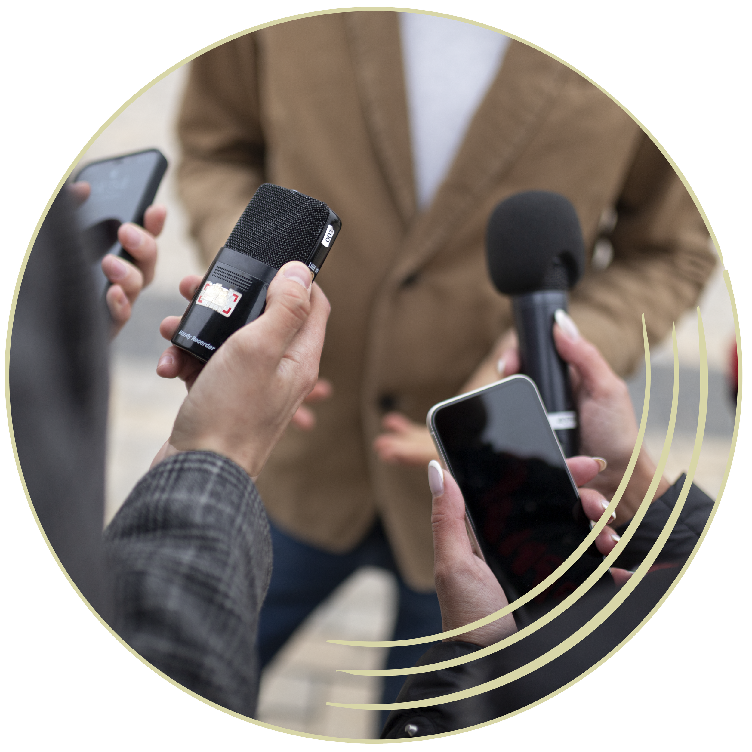 reporter microphones all pointed at a person speaking