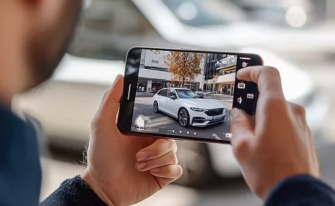 Person capturing car photos on smartphone for AI-powered vehicle damage assessment and claim processing