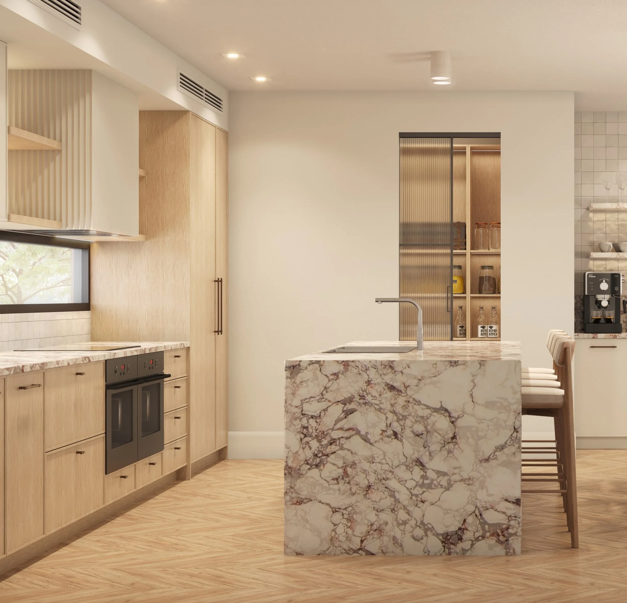 Modern kitchen with marble island, light wood cabinets, and wooden floor. Sleek appliances and barstools add a warm, inviting feel.