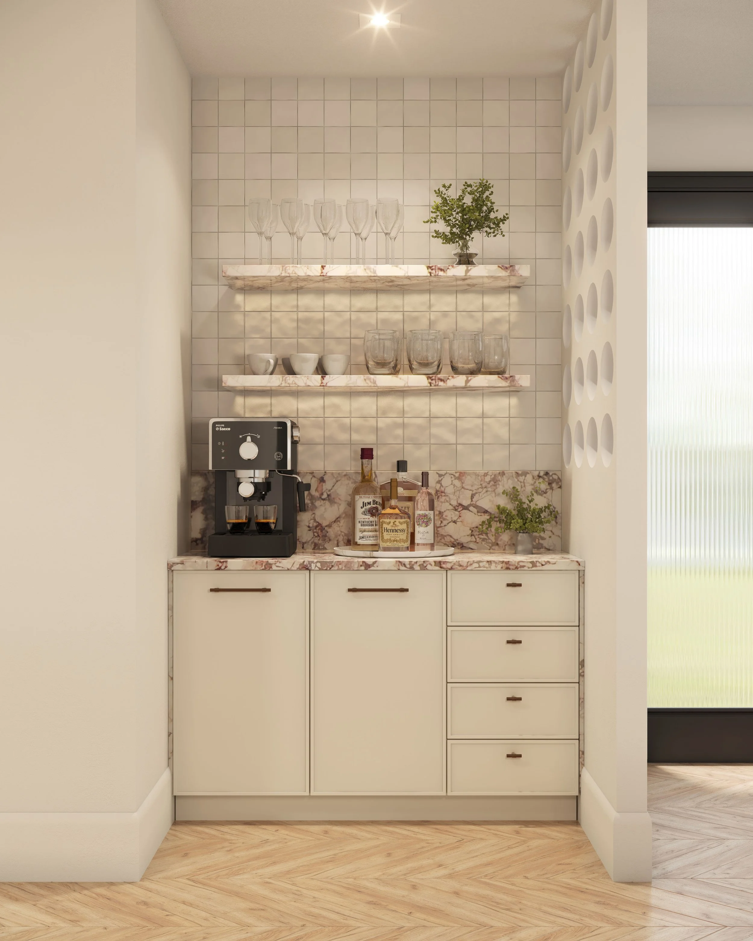 Modern home coffee bar with beige cabinets and marble countertop. Shelves hold glasses and a plant. A coffee maker and liquor bottles are on the counter.