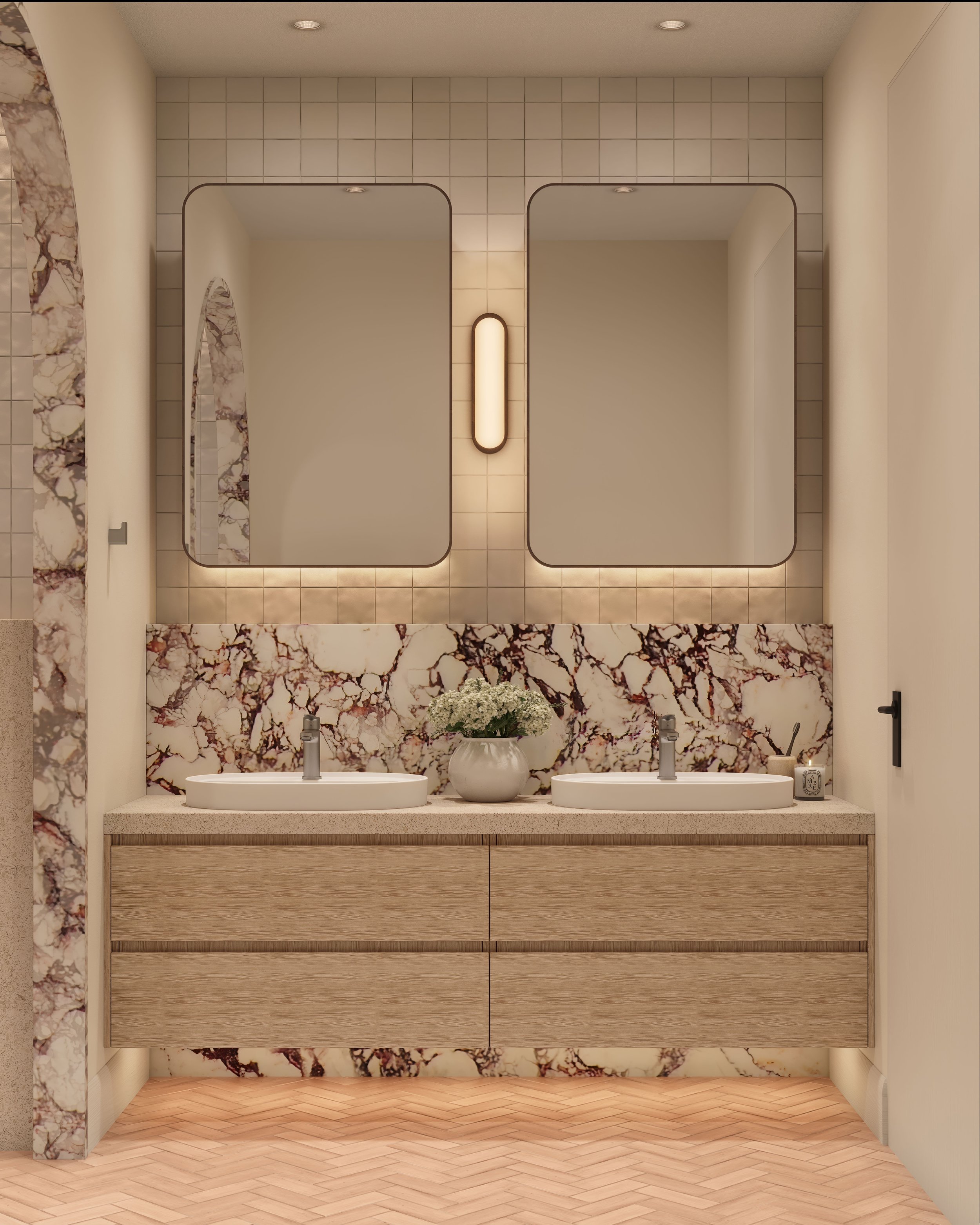 Modern bathroom with two square mirrors, a central light, and a marble backsplash. Twin sinks on a wood vanity; vase with flowers adds elegance.