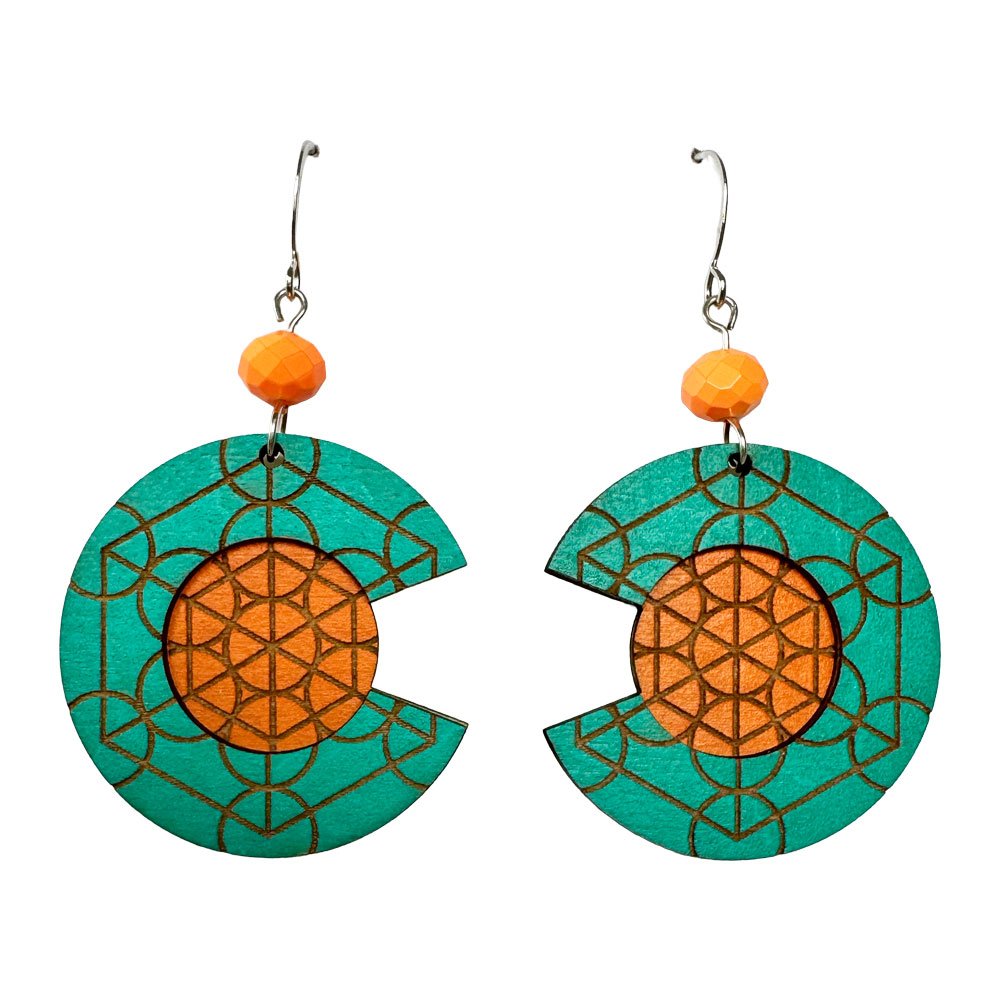 Colorful geometric earrings with orange beads and a teal and orange circular design.