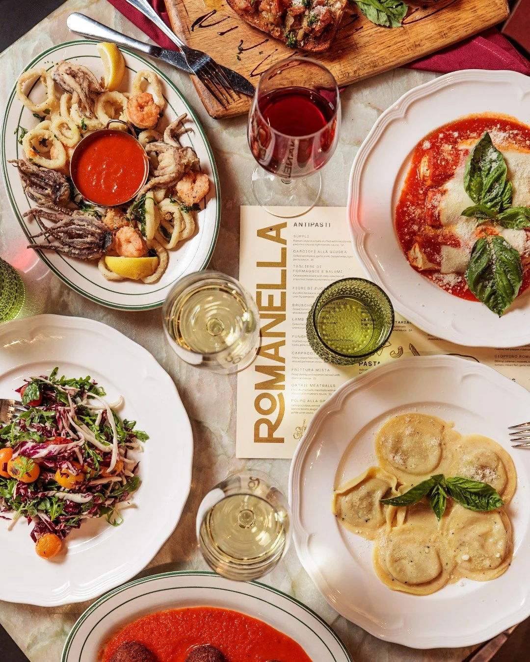 Sunday nights at Romanella mean a table full of classics, shared plates, and conversation that lingers past the last bite.