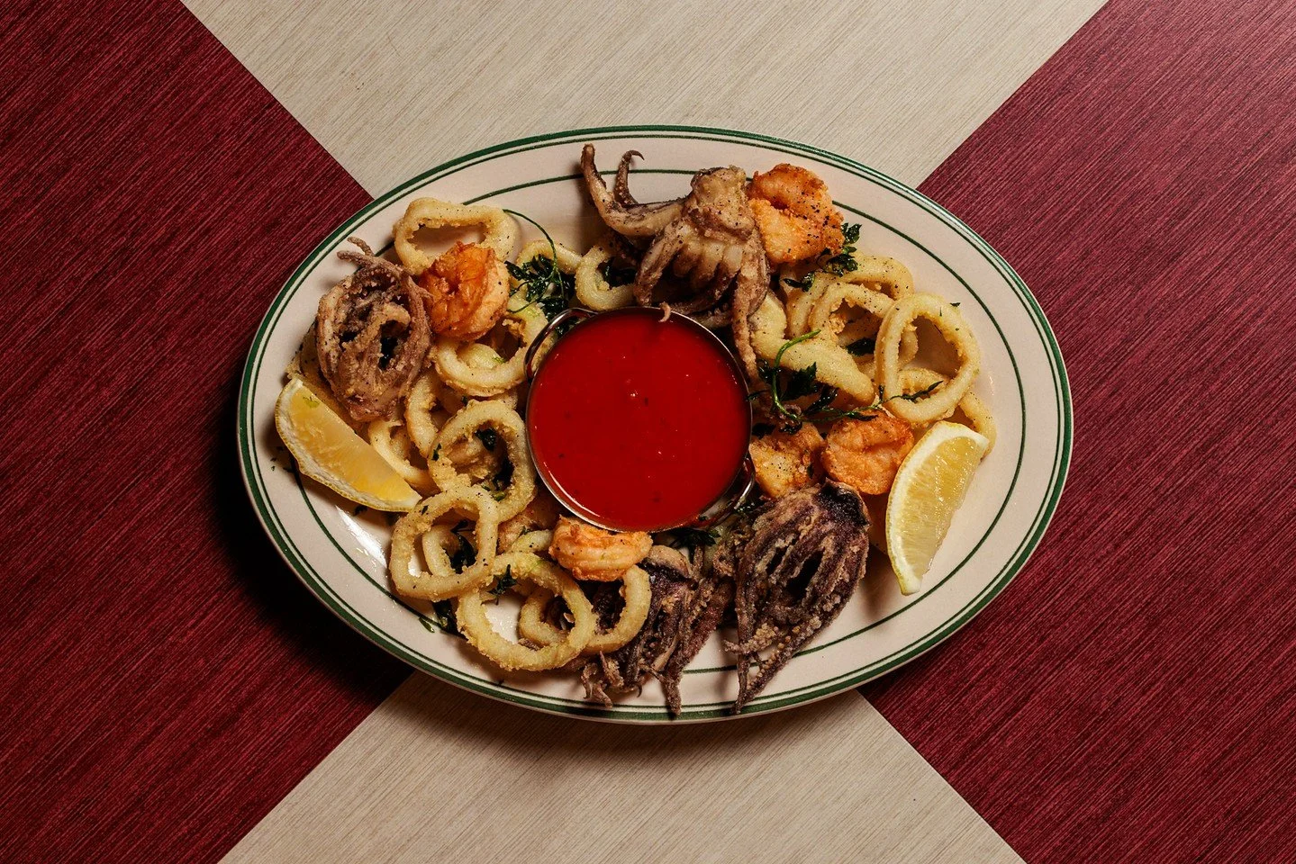 Every table has a starting point. Ours just happens to be calamari. Crisp, classic, and meant to be shared before the rest of the night unfolds.