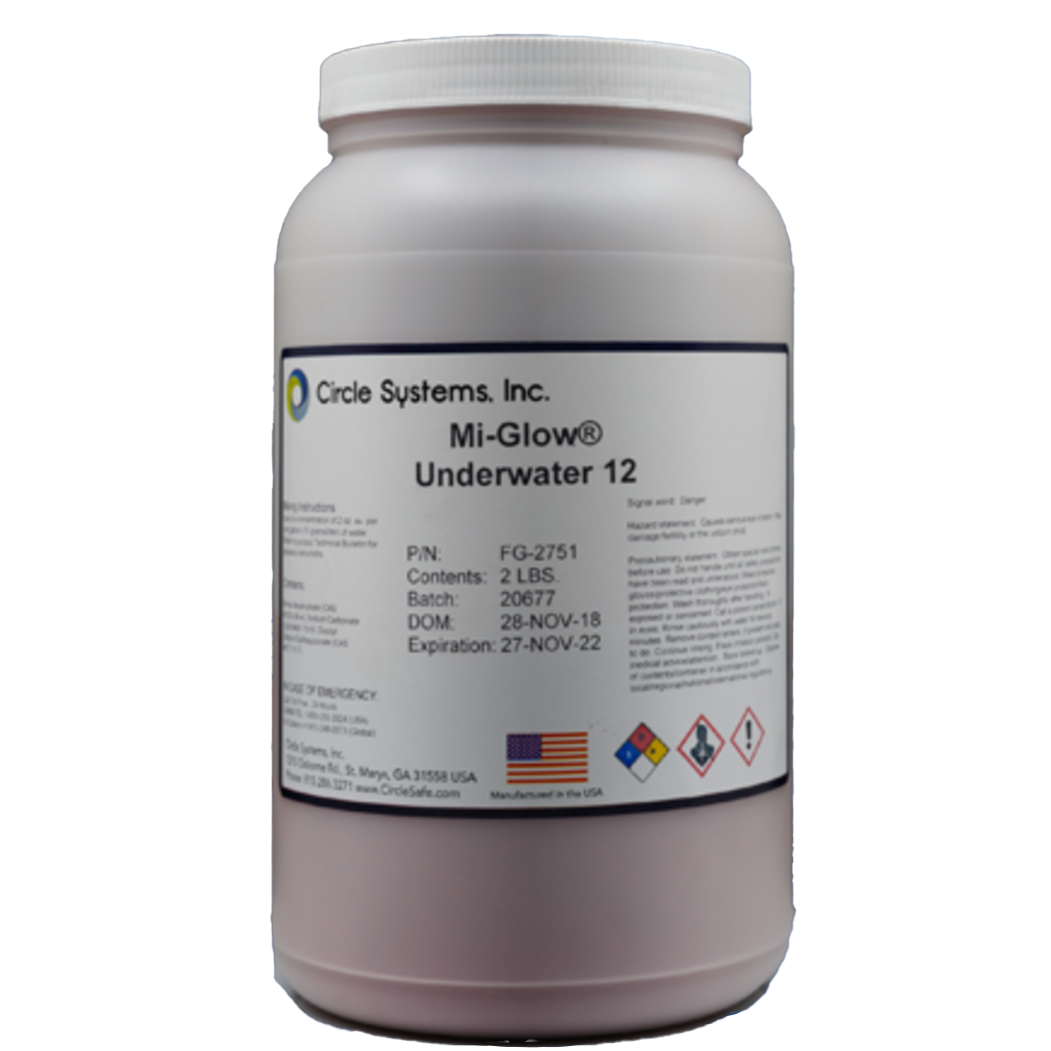 Envase blanco de producto químico llamado Mi-Glow Underwater 12, fabricado en Estados Unidos, con instrucciones y símbolos de advertencia en la etiqueta.
