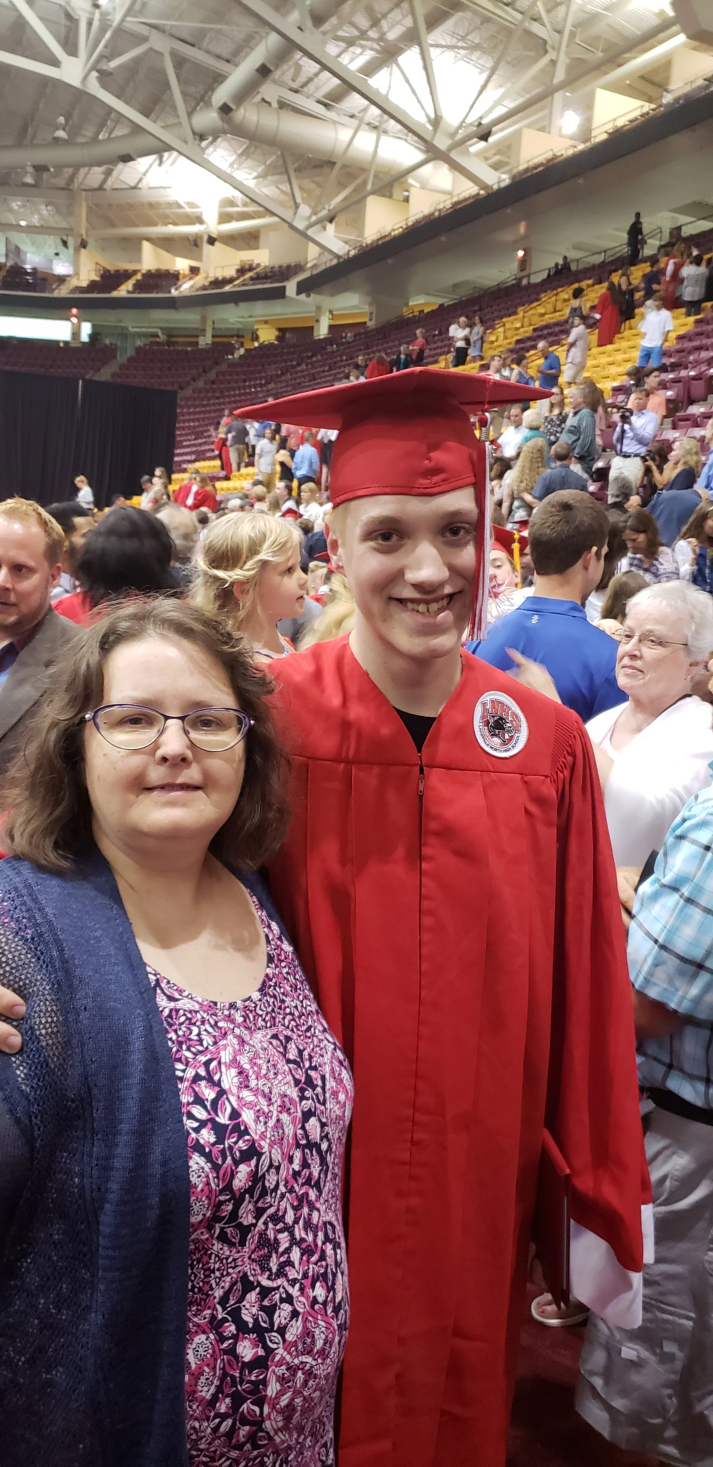 Tracy & Steven Schroer at Lakeville North Highschool Graduation ceremony circa 2018