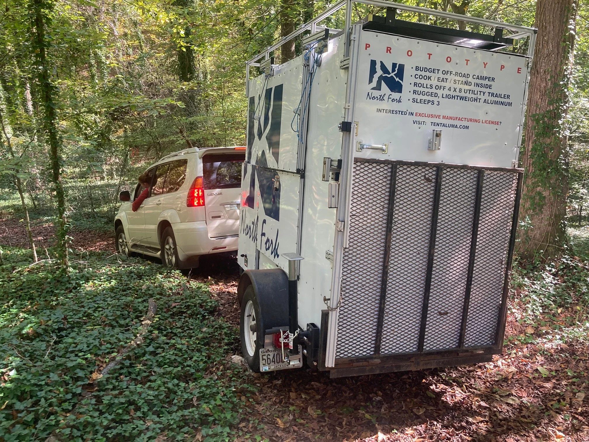 A North Fork off-grid micro-camper overlanding in the Appalachian mountains.  Its 4 x 8 footprint and light weight (2000 lb.) lets adventurers go farther into the wilderness.