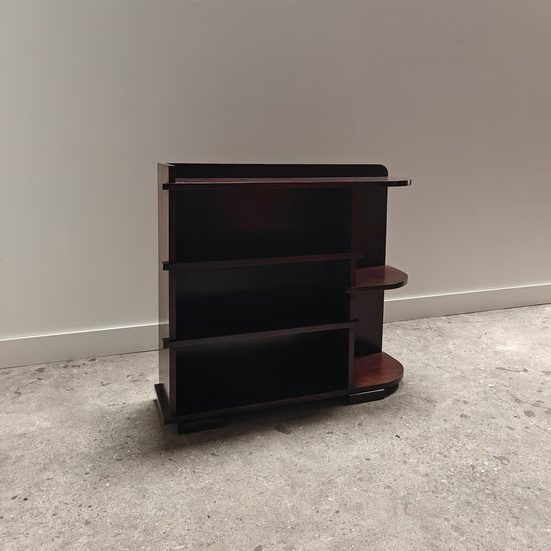Dark asymmetrical modernist shelving unit