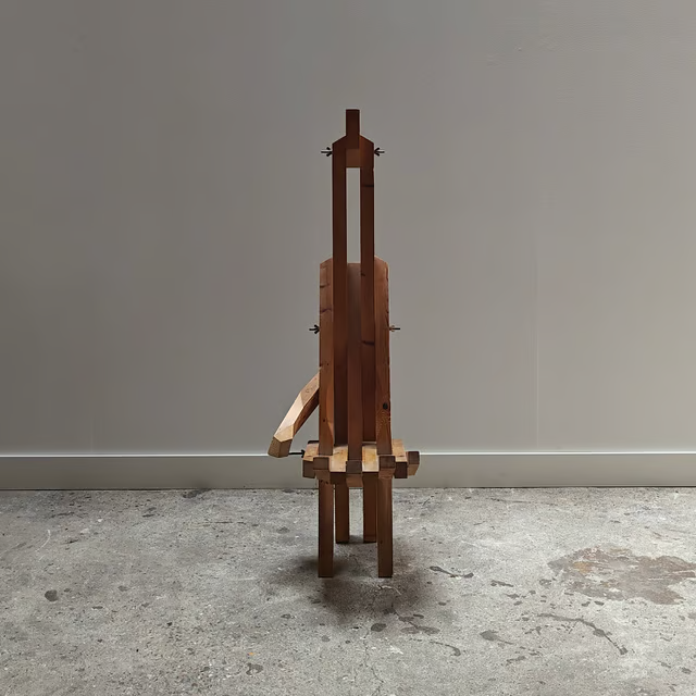 Sculptural hand shaped slatted chair 4.png