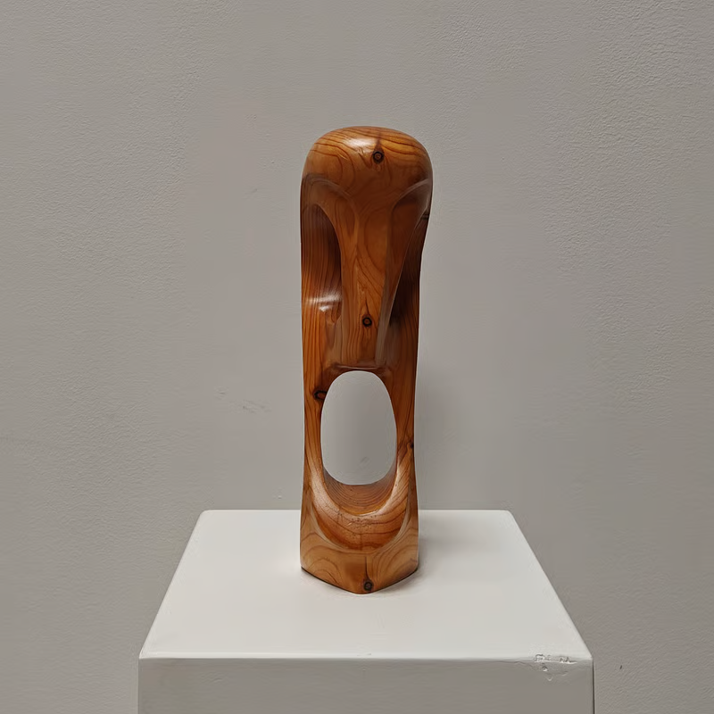 Blond wooden sculpture 1.png