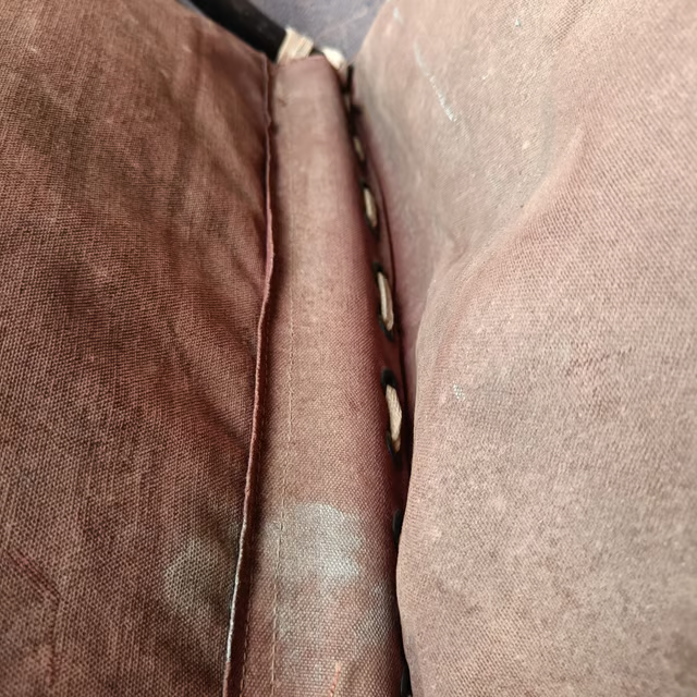 Low tubular and canvas lounge chair 4.png