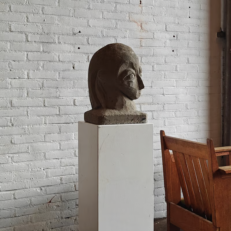 Concrete sculpture, stylized head 3.png