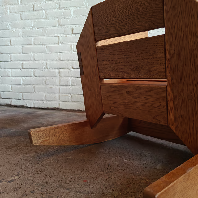 Versatile and sculptural oak stool 2.png