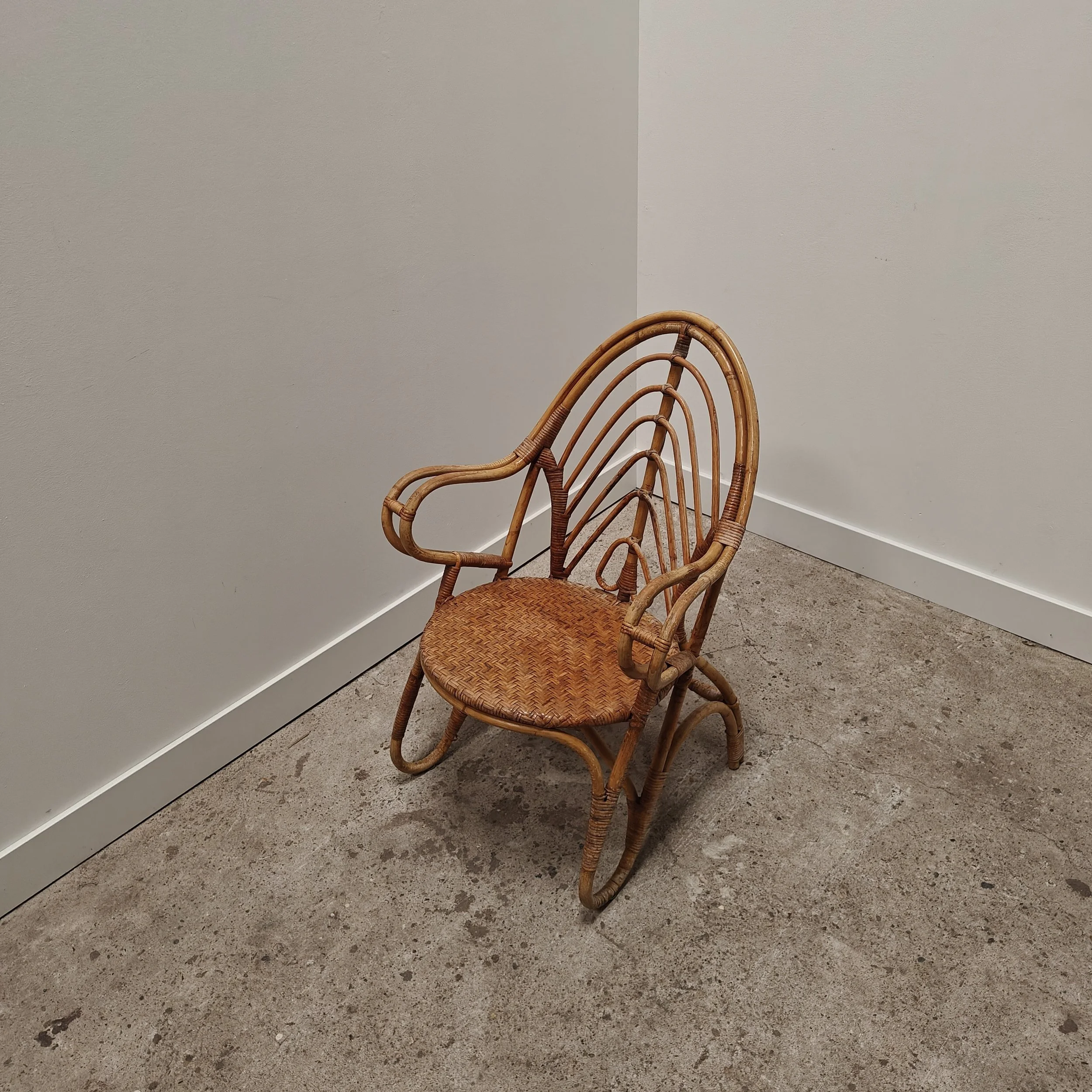 Rattan armchair from the 1950s sold by PFL de Ridder Hartenstraat Amsterdam 2.jpg